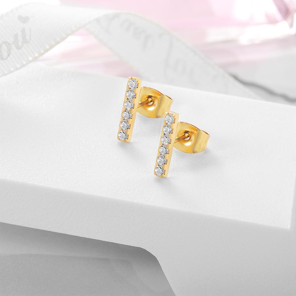 These dazzling earrings perfectly preserve your shine with a diamond bar formation. Ideal for enhancing any ensemble with a timeless charm. Crafted from hypo-allergenic metal, they're ideal for those with sensitive skin. CZ Diamonds. 