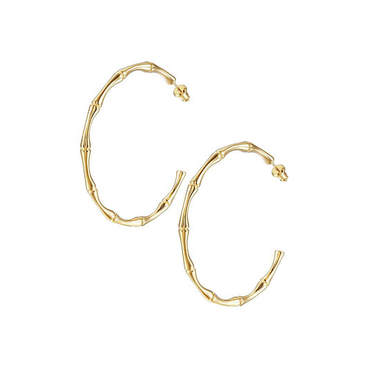 Our bamboo hoops put a twist on the classic version of gold hoops. Their versatile design makes them perfect for a day at the office or a night out. Stainless Steel Hoop Diameter: 2.11"